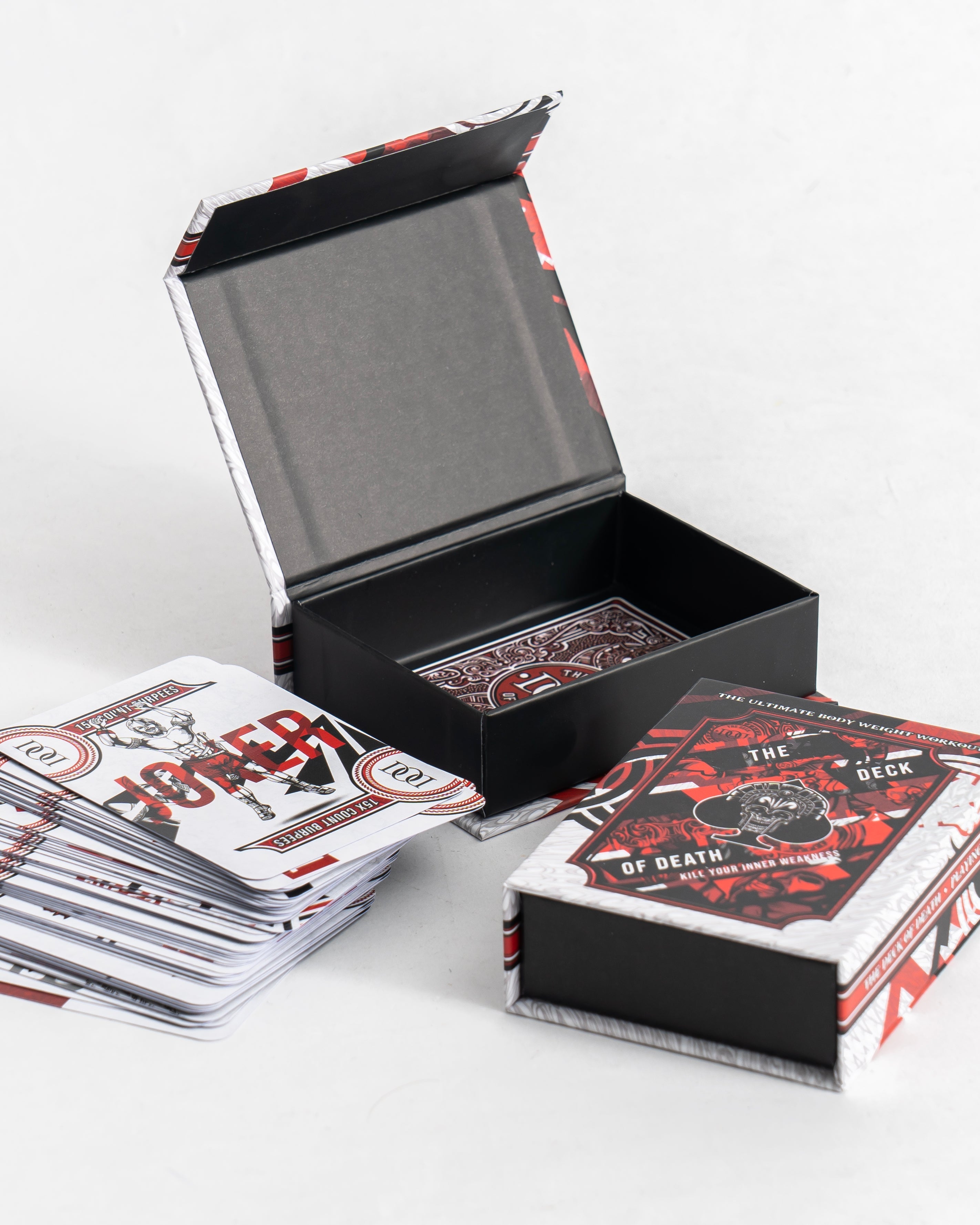 Playing cards with red and black design on a white background