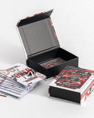 Playing cards with red and black design on a white background